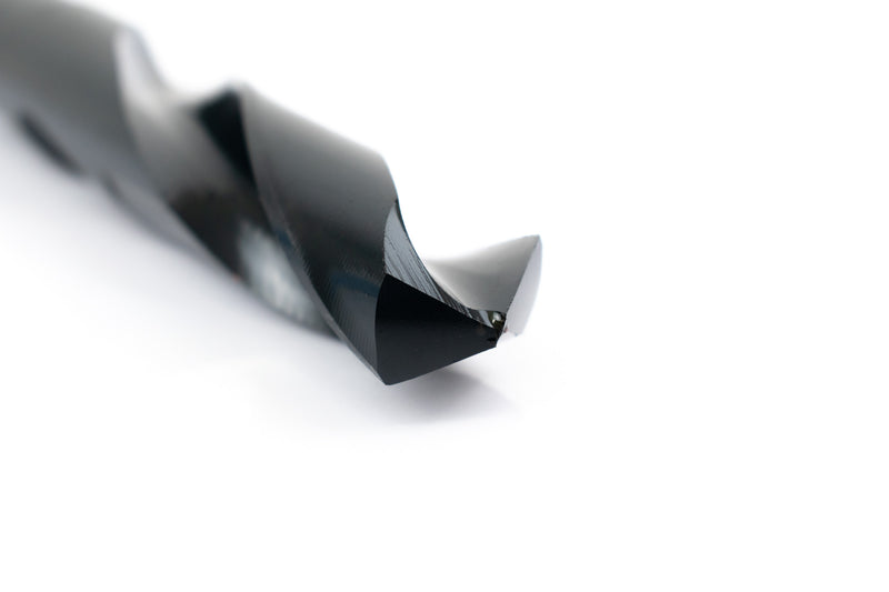 Angled view of a 25/32" HSS reduced shank drill bit, focusing on the sharp drill point and shank